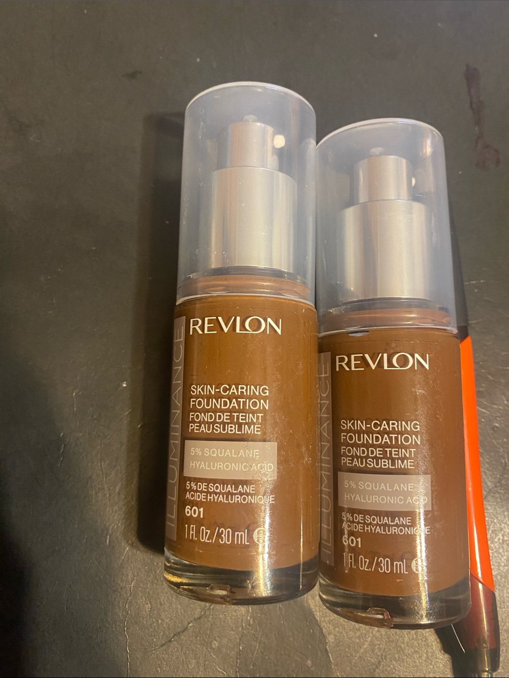 Revlon Skin-Caring Foundation - 601 Deep Brown (Pair)